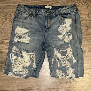 Cello ripped jeans , front & back have rips .